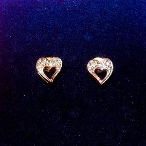 Delicate genuine diamond chip and gold heart shaped earrings.